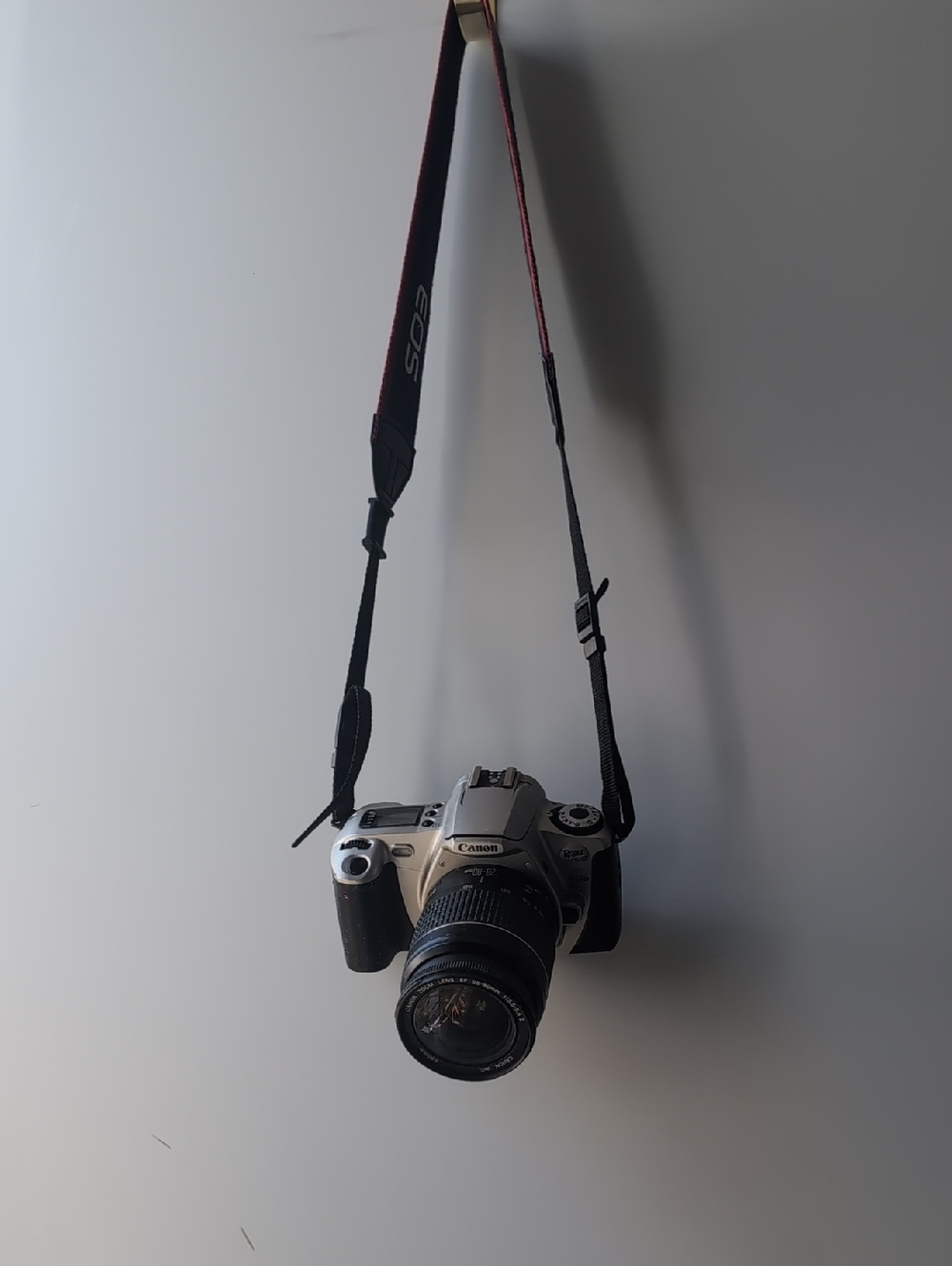 Vintage Canon Silver and Black Camera with Zoom Lens